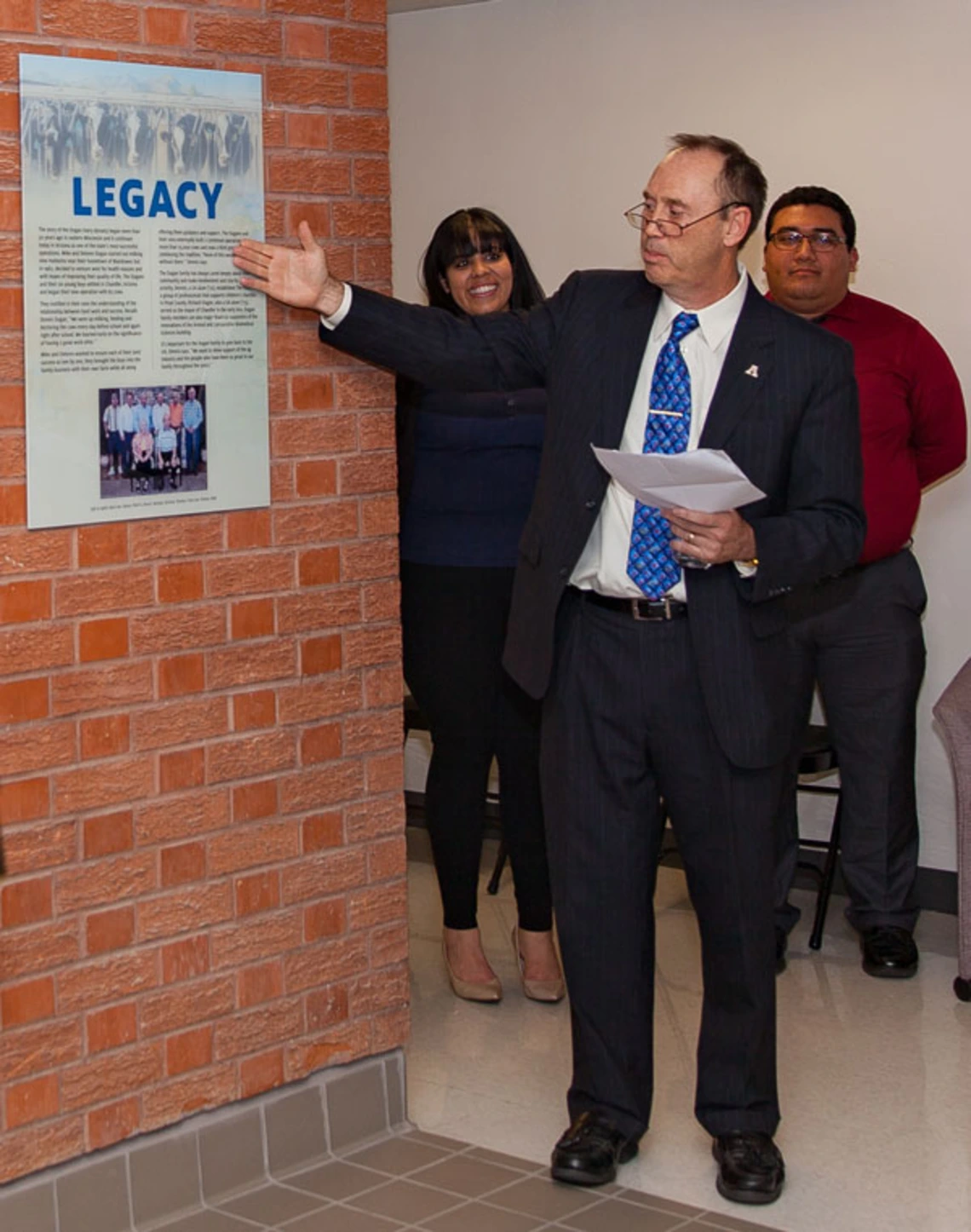 CALES Dean Shane Burgess speaks about the Dugan family legacy. CALES Dean Shane Burgess Reading Sign
